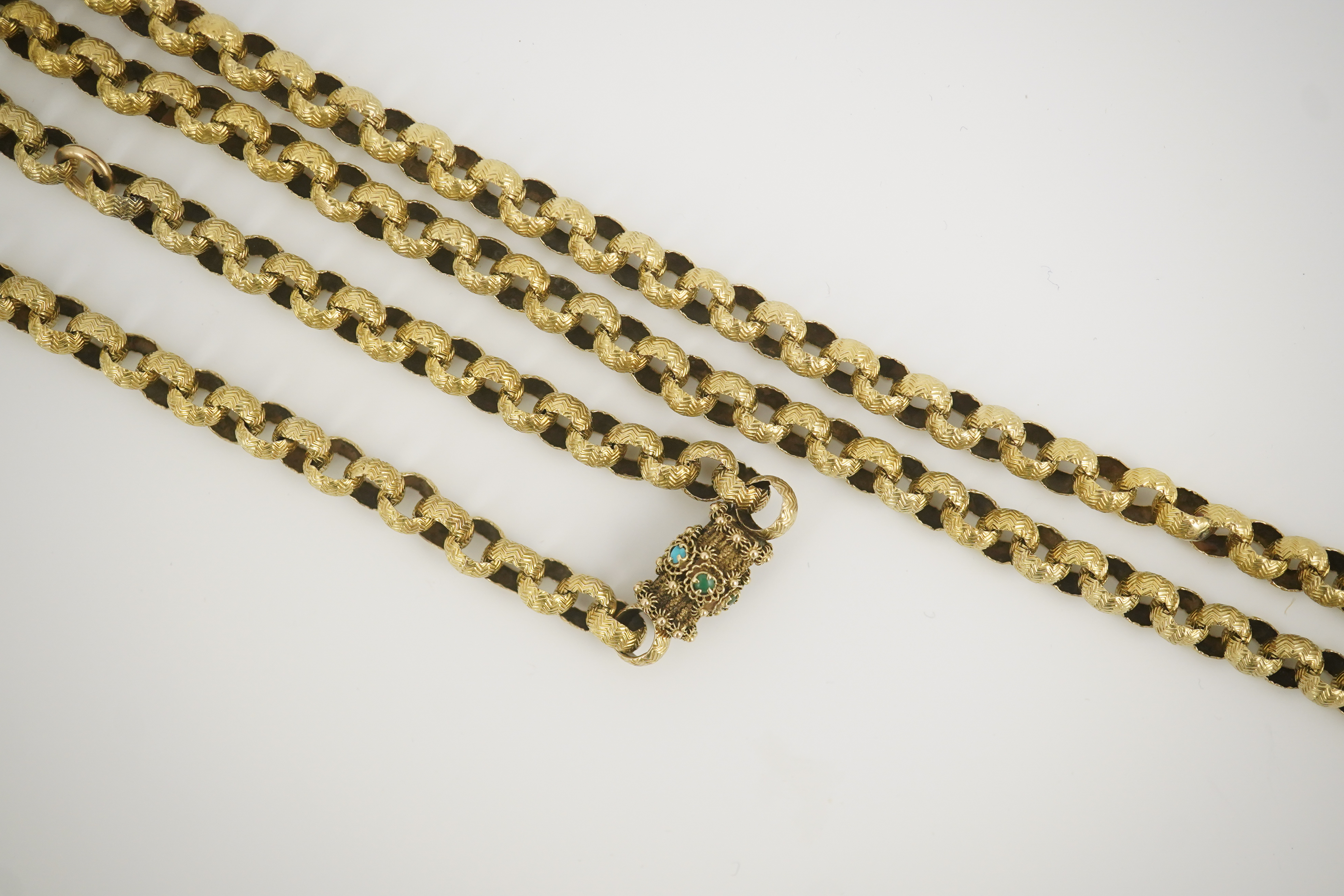 A Georgian gold textured circular link muff chain, with turquoise cluster set barrel shaped clasp